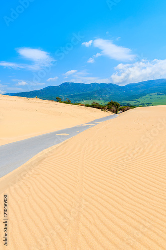 Road and sand dunes near Paloma beach, Costa de la Luz, Spain