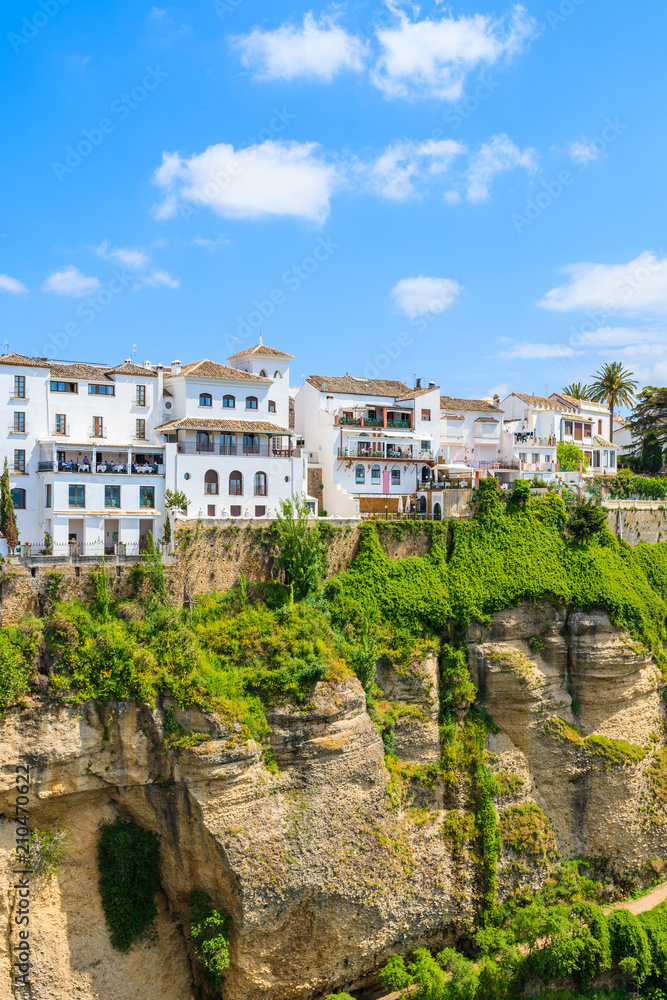 White houses on cliff in Andalusian village of Ronda, Spain