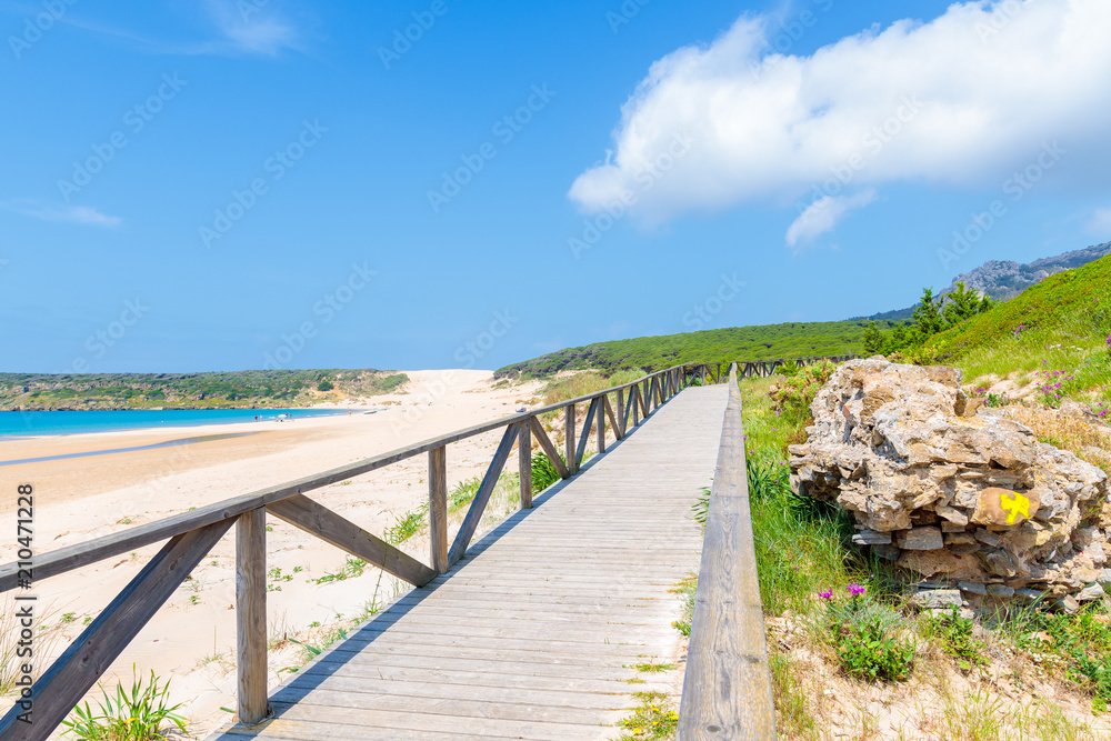 Wooden coastal promenade along Bolonia beach, Andalusia, Spain Wooden coastal promenade along Bolonia beach, Andalusia, Spain