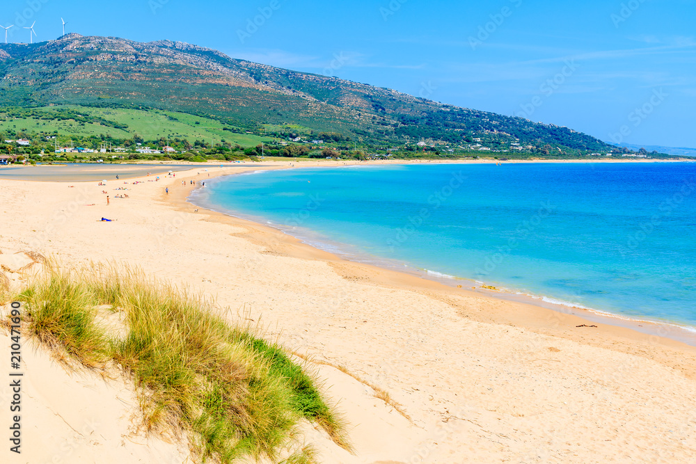 Sandy Paloma beach and view of sea bay, Andalusia, Spain