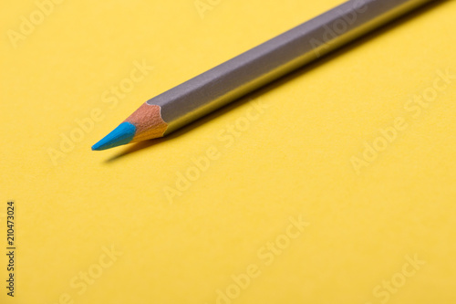 Pencil on a yellow background
