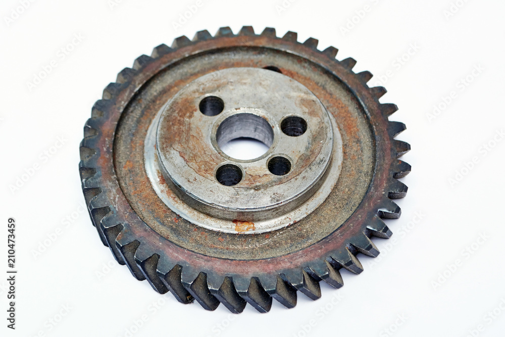 Rusted cog-wheel isolated on white background Rusted cog-wheel isolated on white background