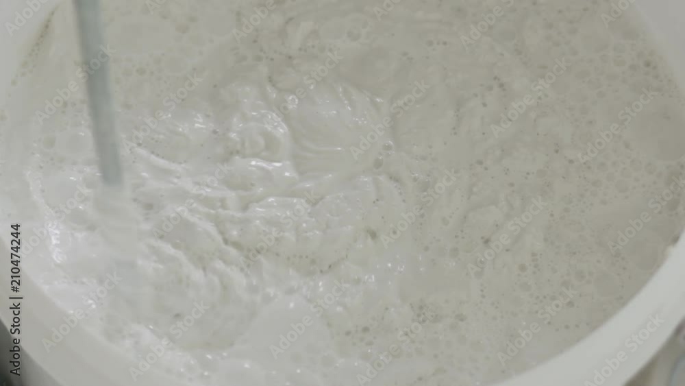 closeup mixing decorative concrete plaster