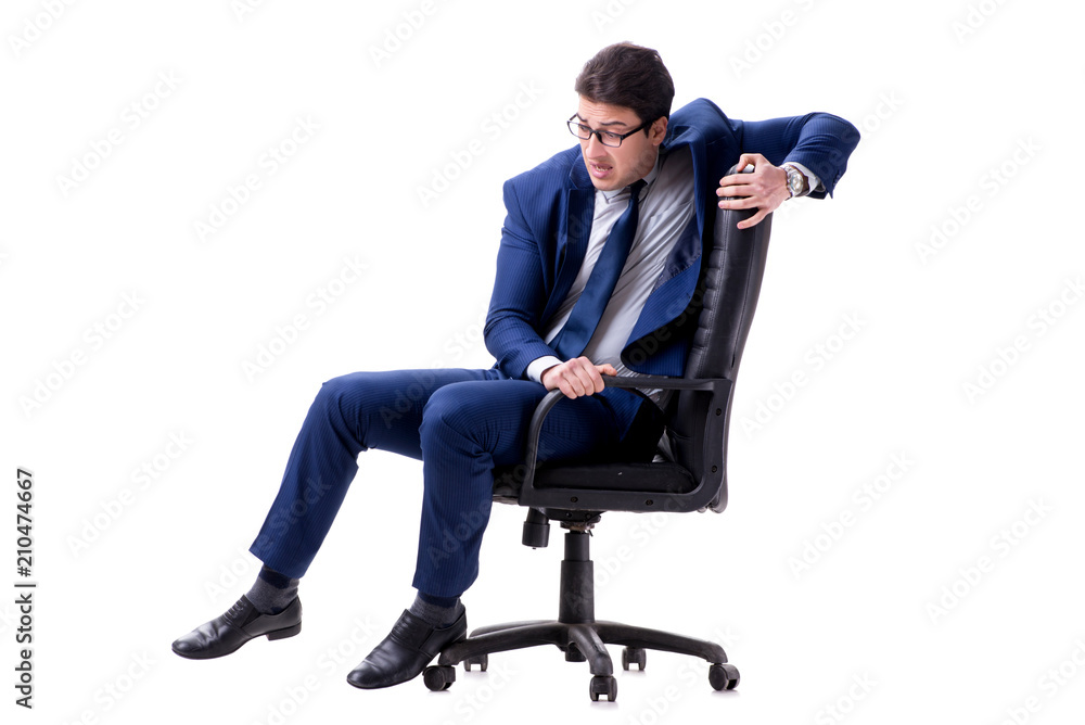 Businessman sitting on office chair isolated on white