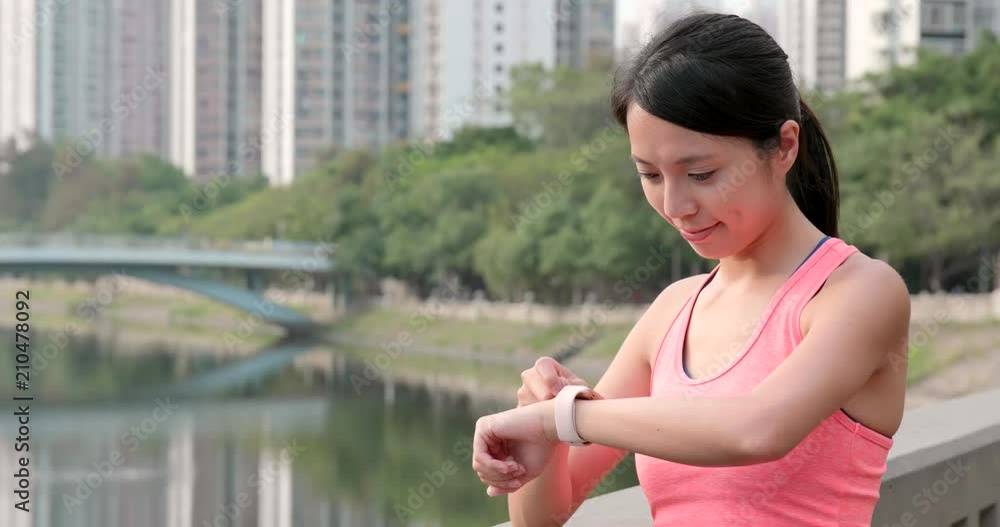 Sport woman use of smart watch Sport woman use of smart watch