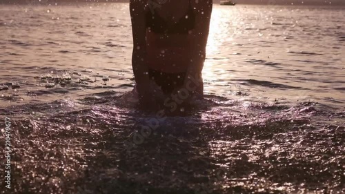 Wallpaper Mural sexy girl doing splashes on the water. Pleases with rest and holidays and freedom at sea. Exploring with friends Torontodigital.ca