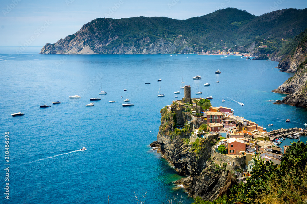 Horizontal View of the Town of Vernazza on blue Sea and the Coastline of the Liguria Background. I