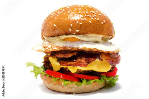 Juicy burger of beef on a white background. Side view