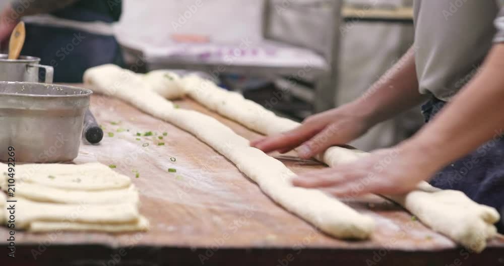 Making bread inside kitchen in chinese restaurant Making bread inside kitchen in chinese restaurant
