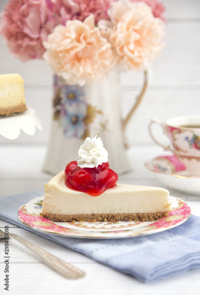 Freshly Baked Cherry Cheesecake on a Plate Freshly Baked Cherry Cheesecake on a Plate