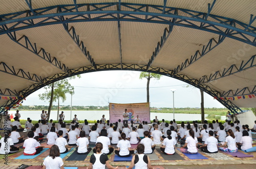 Khon kaen, Thailand - June 24 2018 People takes part in a mass yoga session to mark 4th International Yoga Day in Khon Kaen Thailand photo