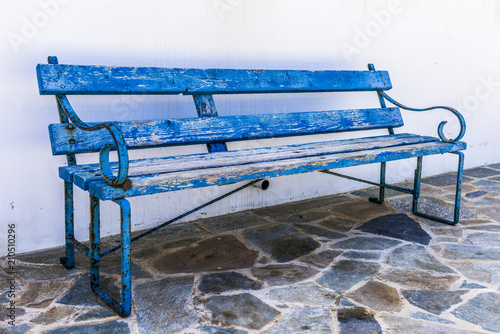 The old bench near white wall Church