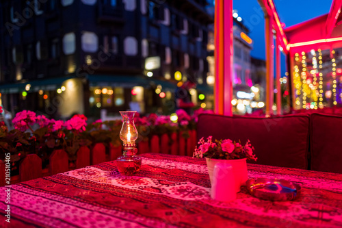A restaurant table in the Sultanahmed area at night in Istanbul photo