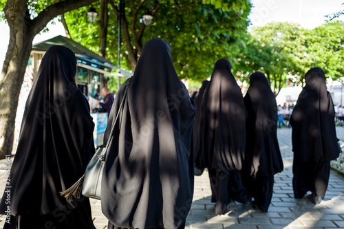 Muslim women in burka walking the streets of Sultanahmed, Istanbul. photo
