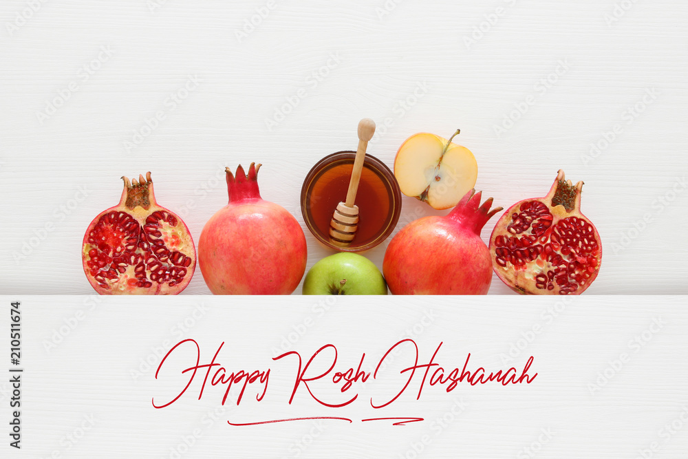 Obraz premium Rosh hashanah (jewish New Year holiday) concept. Traditional symbols.