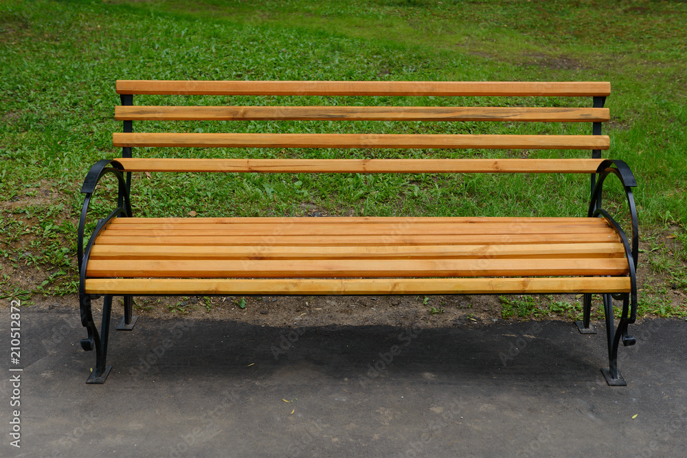wooden bench in the park not green grass wooden bench in the park not green grass