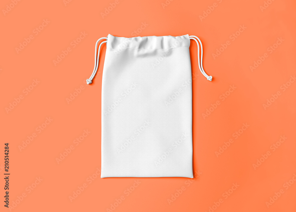 White drawstring bag on color background. Fabric cotton small bag. Isolated pouch. White drawstring bag on color background. Fabric cotton small bag. Isolated pouch.