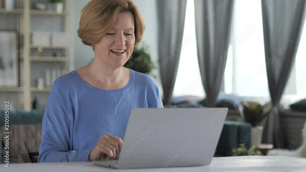 Online Video Chat on Laptop by Senior Woman Online Video Chat on Laptop by Senior Woman