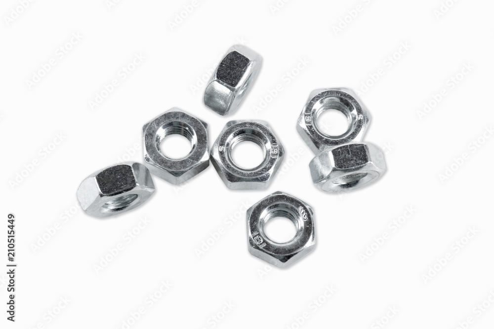 Nuts, screw isolated on the white backgrounds Nuts, screw isolated on the white backgrounds