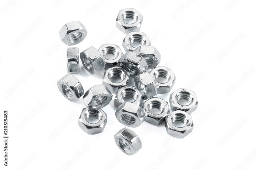 Nuts, screw isolated on the white backgrounds Nuts, screw isolated on the white backgrounds