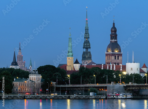 Night view on historical center of old Riga - the capital of Latvia and the largest city of Baltic region widely known by its unique medieval and Gothic architecture
