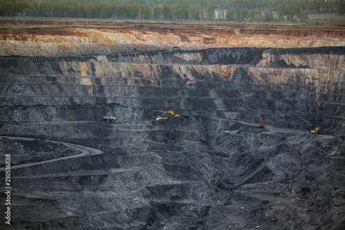 Quarry for coal mining. Autumn landscape.