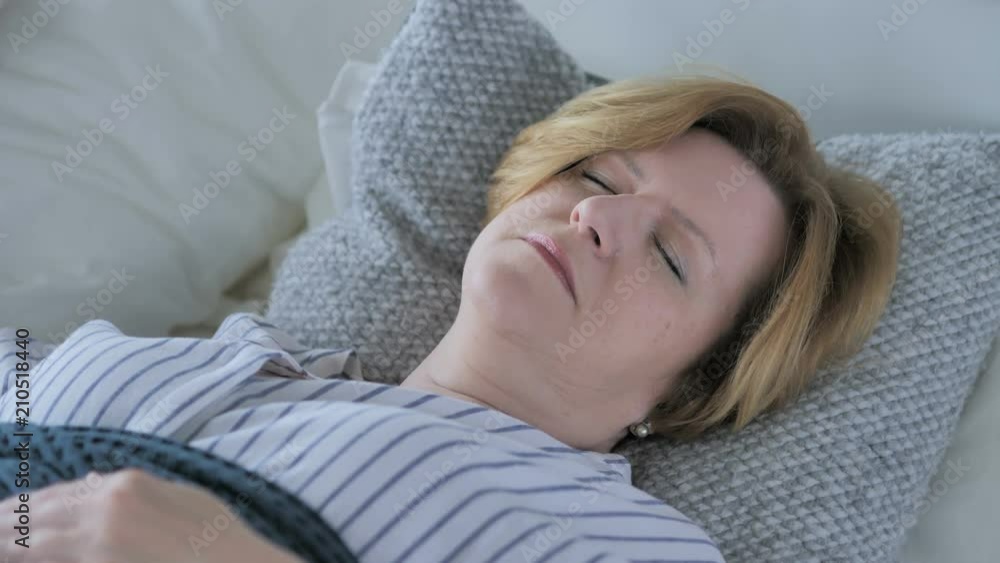 Relaxing Old Senior Woman Sleeping in Bed Relaxing Old Senior Woman Sleeping in Bed