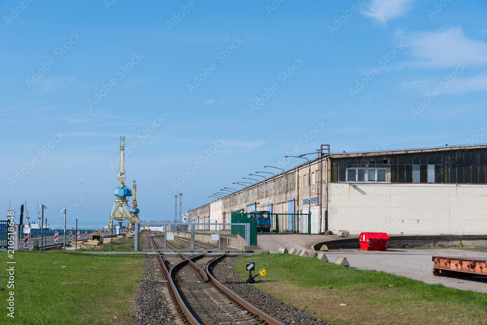 Railroad tracks towards the pier at port of Rostock in Germany