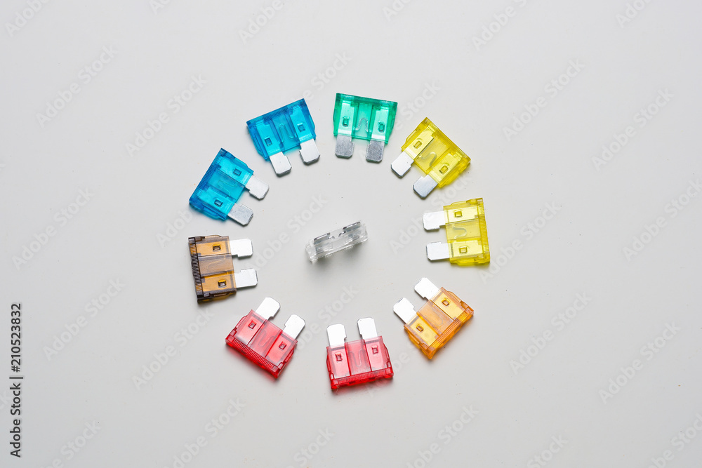 Obraz premium Car fuse. colorful electrical automotive fuses