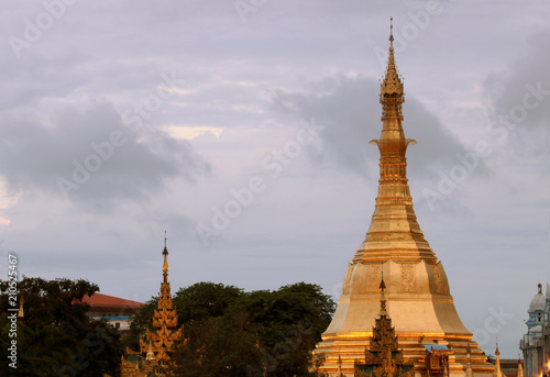 Golden octagon of Sula pagoda located in the heart of downtown on the junction of Sule Pagoda road, Yangon, making it more than 2,600 years old. photo