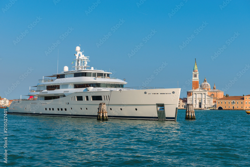 White motor ship parked in the Grand Canal, Venice, Italy