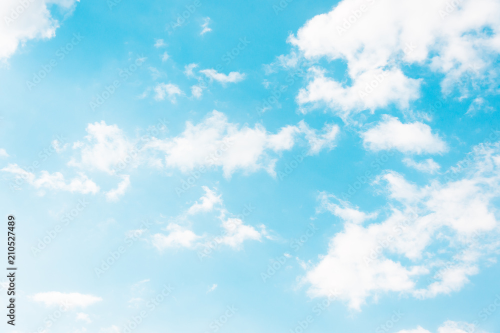 Blue sky with torn white formless clouds. Blue sky with torn white formless clouds.