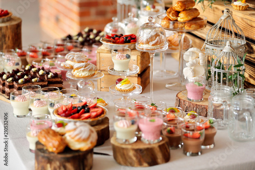 Catering sweets, closeup of various kinds of fruit pastry on event or wedding reception