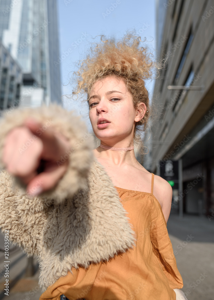 beautiful girl walking through the city streets beautiful girl walking through the city streets