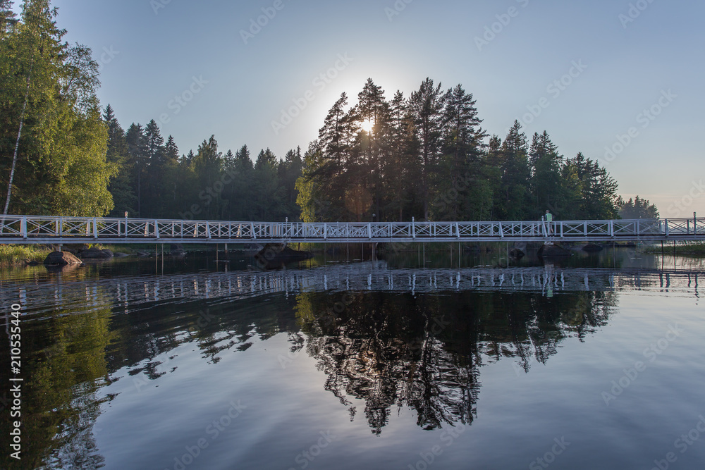 Fototapeta premium White bridges over water connecting islands are reflected in water