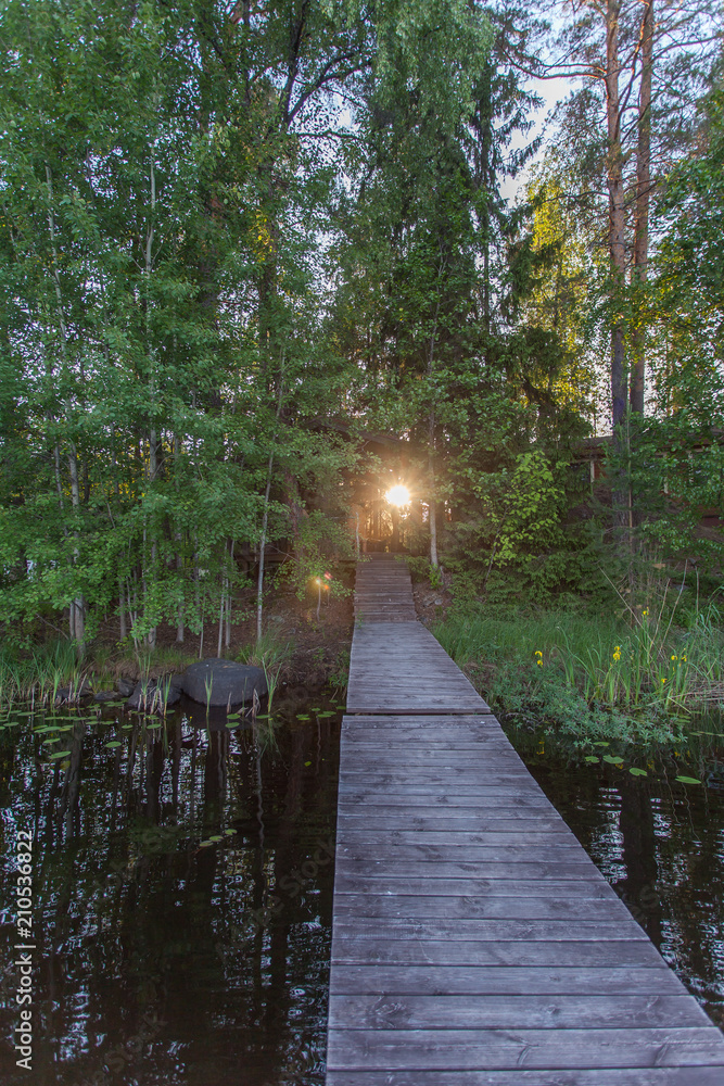 View of the wooden pier of the lake in Karelia