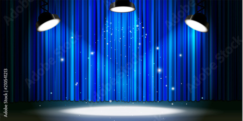 Bright blue curtain with bright spotlight lighting, retro theater stage