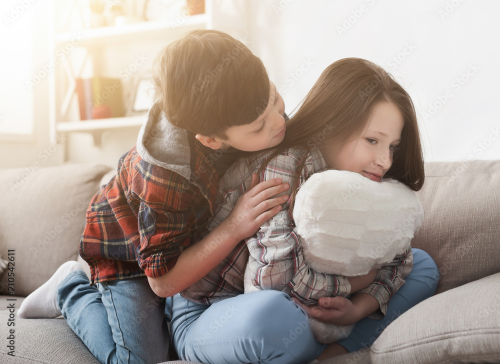 Brother supporting sad girl at home Brother supporting sad girl at home
