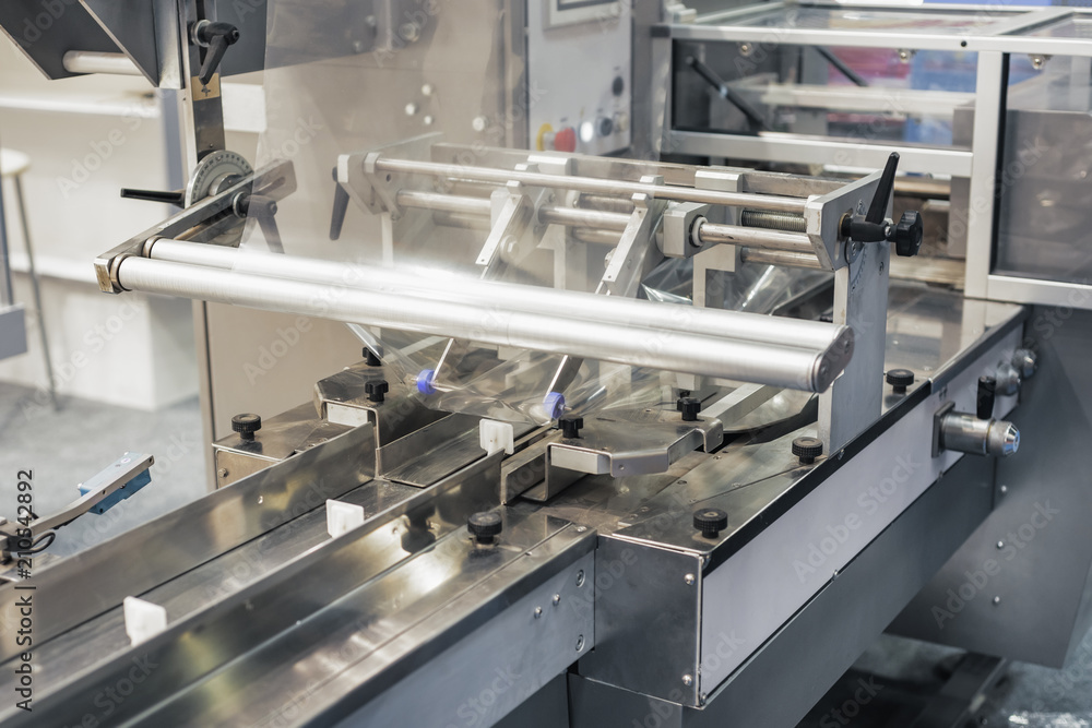 Modern automatic packing machine. Modern automatic packing machine.