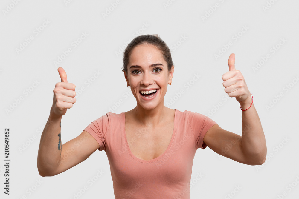 Woman showing thumbs up gesture