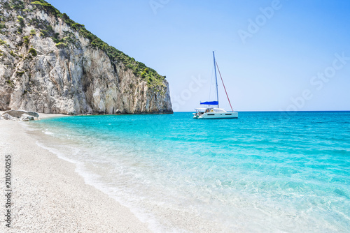 Beautiful lagoon with sailing boat and beach  Lefkada island  Greece