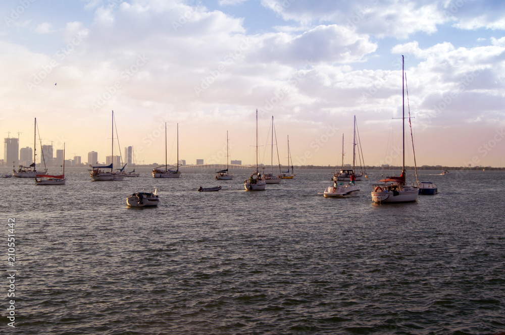 Ships, yachts, fishing boats, blue sky background, sunset, clouds, sea, Miami