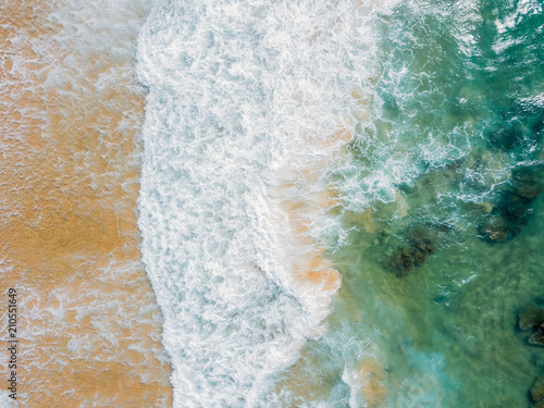 Aerial Panoramic Drone View Of Blue Ocean Waves Crushing On Sandy Beach in Portugal