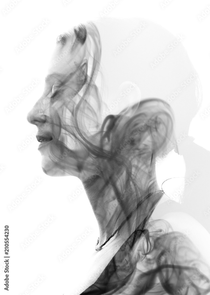 Double exposure portrait of a young woman and a smoky texture Double exposure portrait of a young woman and a smoky texture