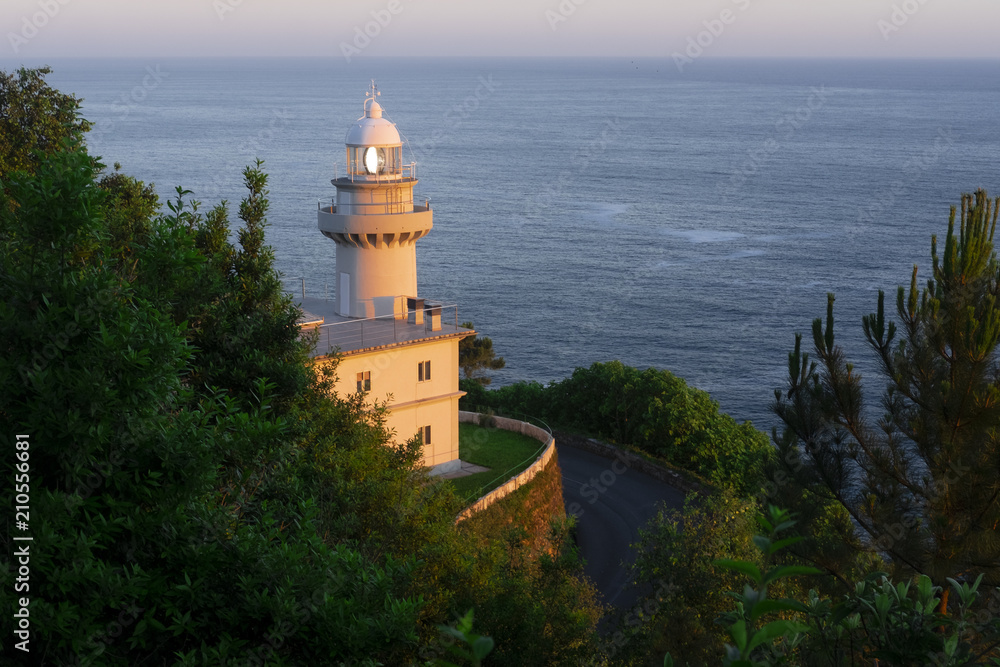 The Igueldo Lighthouse in San Sebastian city, Basque Country, Spain. Photographed at sunrise.