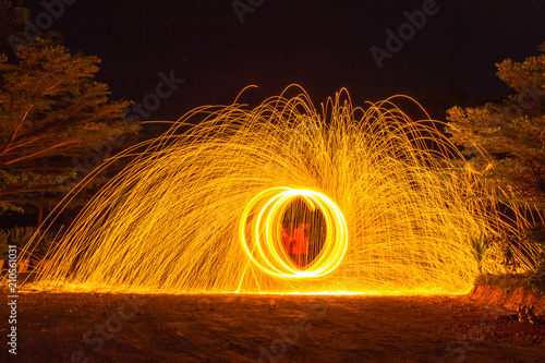 burning steel wool spinning,circle Fire at night