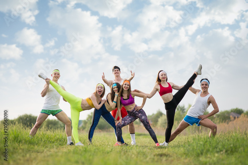 Group of sports people on the grass