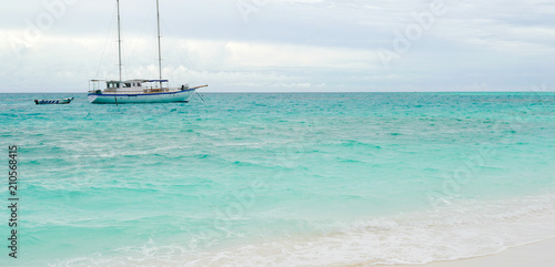 Summer concept , Boat sailing on turquoise sea color at maldives on the weekend holidays © godshutter