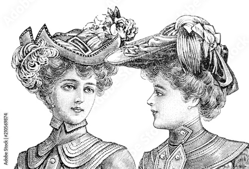 portrait of two women with vintage hats