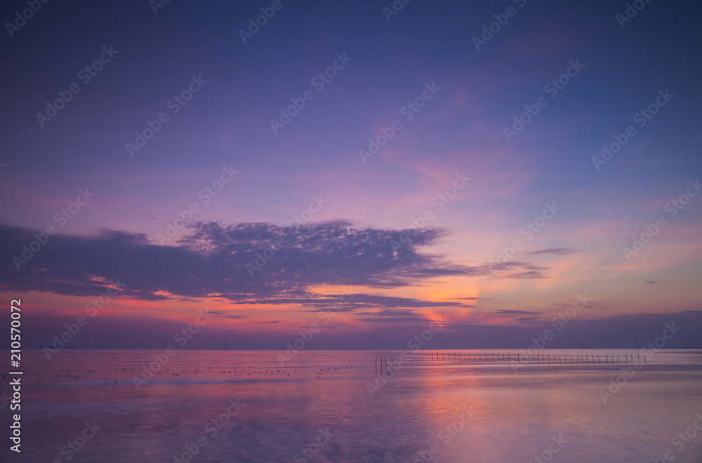 Beautiful sunset landscape view on sea and boat with colorful of sky located eastern of in Thailand